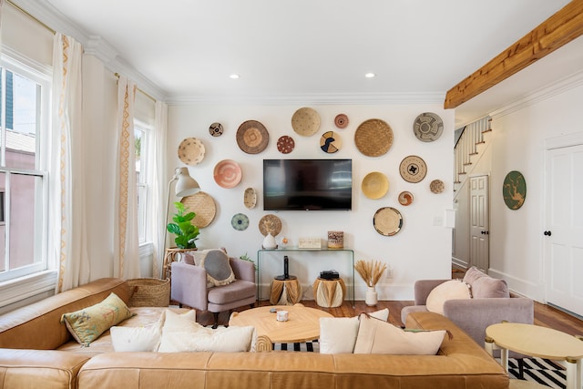 living room with beamed ceiling, wood-type flooring, and crown molding