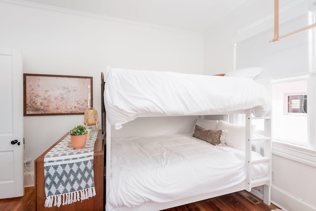 bedroom featuring wood-type flooring