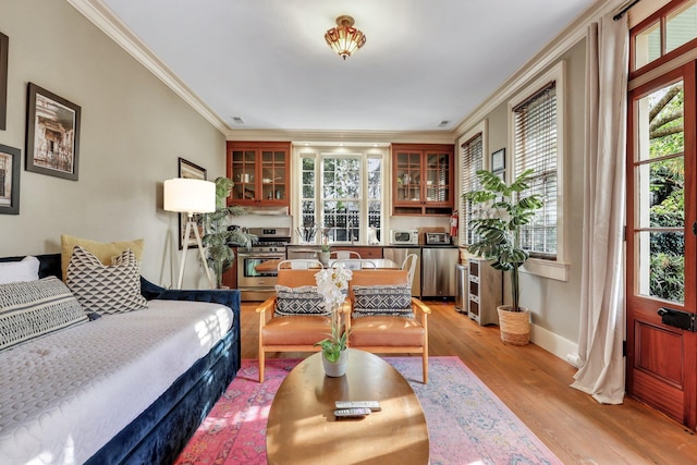 interior space featuring light hardwood / wood-style flooring and ornamental molding