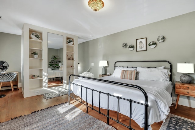 bedroom featuring wood-type flooring