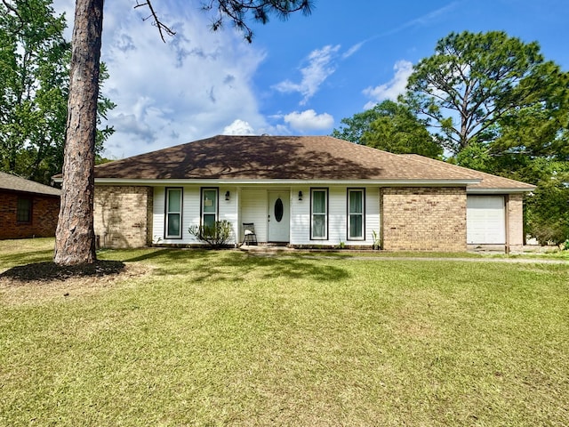single story home featuring brick siding, a garage, covered porch, and a front yard