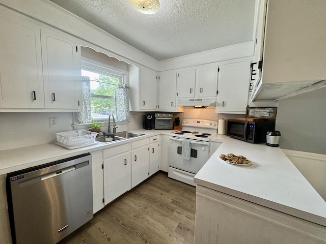 kitchen featuring white range with electric stovetop, black microwave, a sink, stainless steel dishwasher, and under cabinet range hood