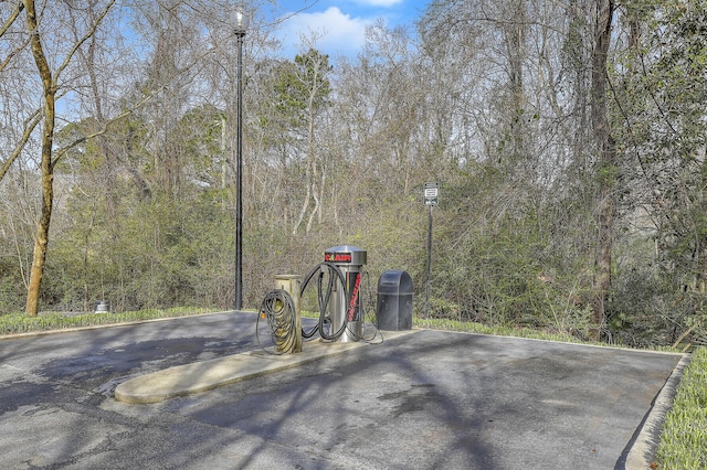 view of street featuring a forest view