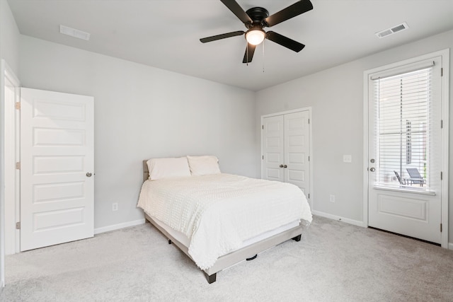 bedroom with carpet, baseboards, and ceiling fan