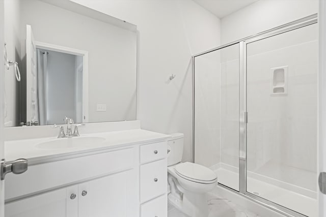 bathroom with marble look tiles, a shower stall, toilet, and vanity