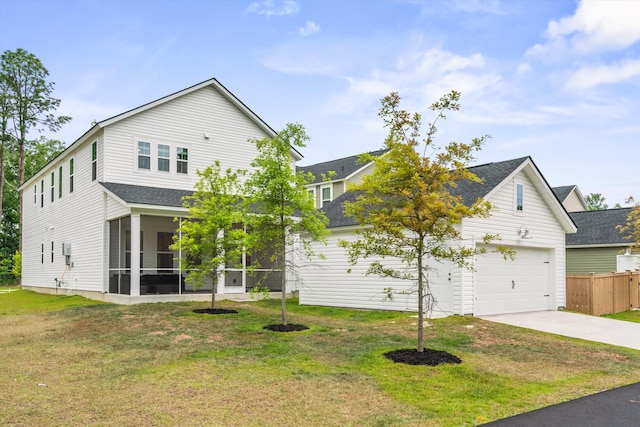 view of front facade with a sunroom, driveway, a shingled roof, and an attached garage