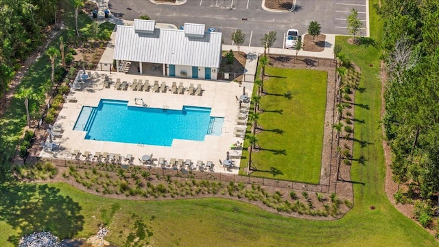 drone / aerial view of a pool area