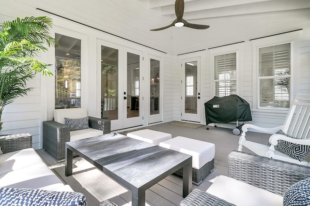 exterior space with french doors and a ceiling fan