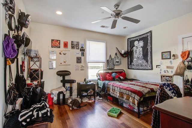 bedroom featuring a ceiling fan, recessed lighting, wood finished floors, and visible vents