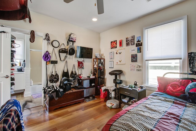 bedroom featuring recessed lighting, ceiling fan, and wood finished floors