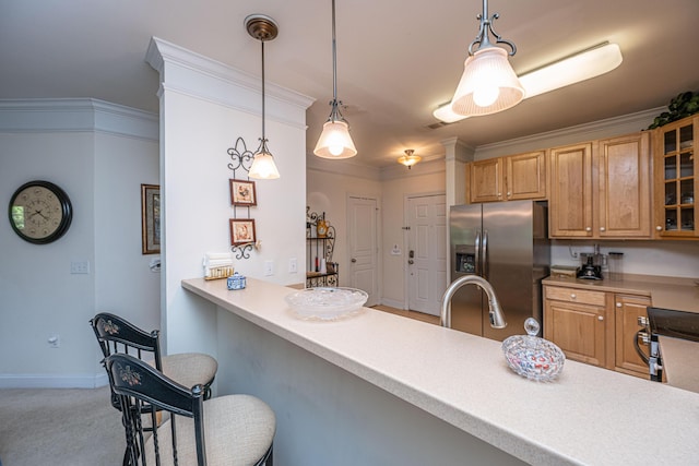 kitchen featuring stainless steel fridge with ice dispenser, a sink, decorative light fixtures, carpet floors, and glass insert cabinets