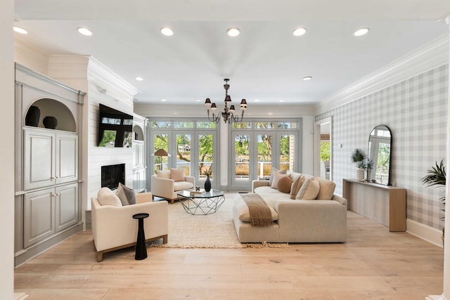 3508 Henrietta Hartford Rd, Mount Pleasant, SC 29466 - living room with crown molding, wallpapered walls, a large fireplace, recessed lighting, and a chandelier