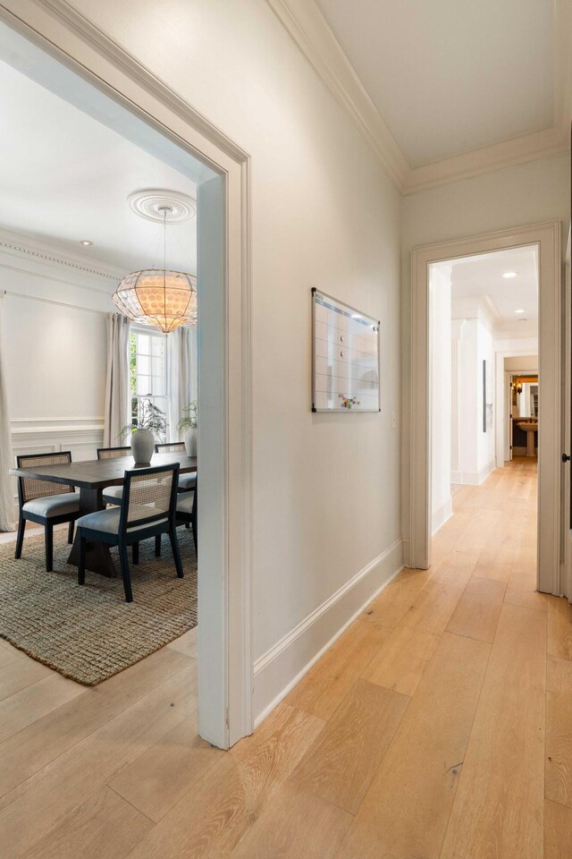 3508 Henrietta Hartford Rd, Mount Pleasant, SC 29466 - hall with light wood-style flooring, ornamental molding, and baseboards