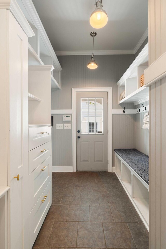 3508 Henrietta Hartford Rd, Mount Pleasant, SC 29466 - mudroom with crown molding, baseboards, and dark stone finish floors