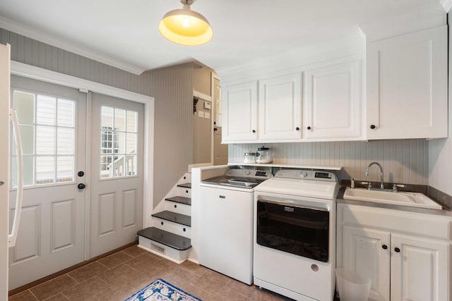 3508 Henrietta Hartford Rd, Mount Pleasant, SC 29466 - laundry room with washing machine and clothes dryer, cabinet space, ornamental molding, french doors, and tile patterned floors