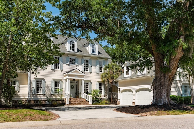 3508 Henrietta Hartford Rd, Mount Pleasant, SC 29466 - view of front of home featuring driveway, a shingled roof, and a garage