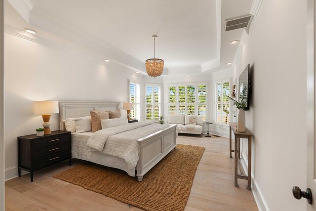 3508 Henrietta Hartford Rd, Mount Pleasant, SC 29466 - bedroom featuring a tray ceiling, crown molding, light wood-type flooring, recessed lighting, and baseboards