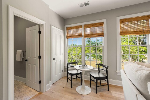 3508 Henrietta Hartford Rd, Mount Pleasant, SC 29466 - dining area with baseboards and light wood-style flooring