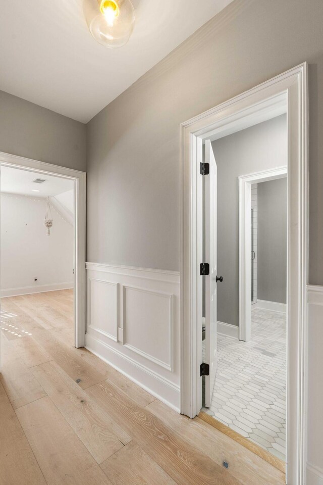 3508 Henrietta Hartford Rd, Mount Pleasant, SC 29466 - hall with light wood finished floors and wainscoting