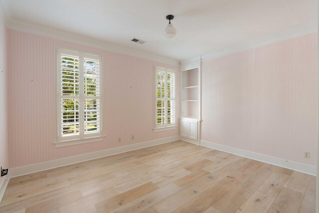 3508 Henrietta Hartford Rd, Mount Pleasant, SC 29466 - spare room featuring crown molding, hardwood / wood-style floors, and baseboards