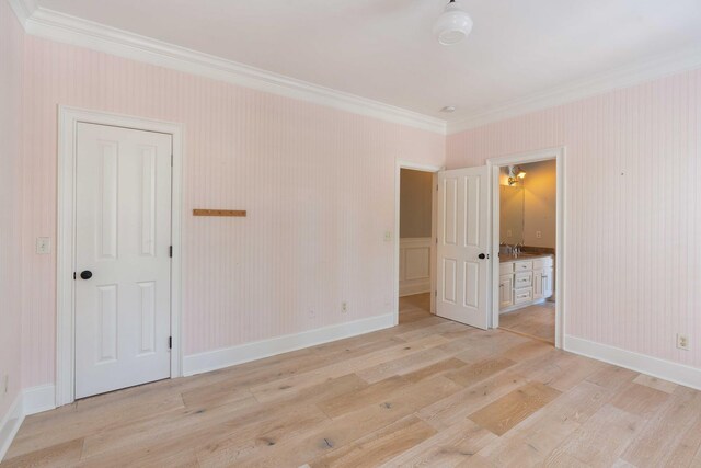 3508 Henrietta Hartford Rd, Mount Pleasant, SC 29466 - spare room featuring light wood finished floors, crown molding, baseboards, and a sink