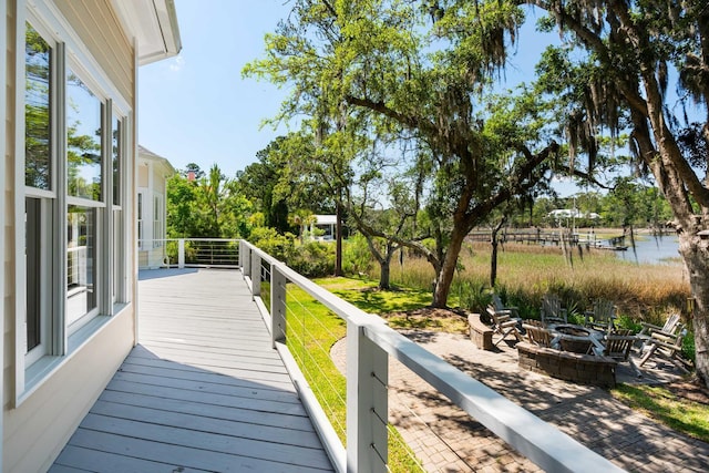 3508 Henrietta Hartford Rd, Mount Pleasant, SC 29466 - wooden deck with an outdoor fire pit