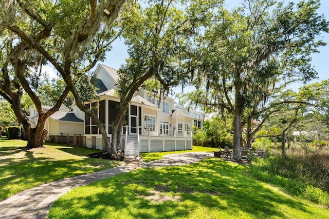 3508 Henrietta Hartford Rd, Mount Pleasant, SC 29466 - view of grassy yard featuring a sunroom