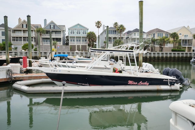 40 41st Ave Unit B 9, Isle Of Palms, SC 29451 - dock featuring a water view and a residential view