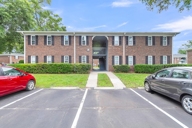 21 Rivers Point Row Unit 17G, Charleston, SC 29412 - view of property featuring uncovered parking