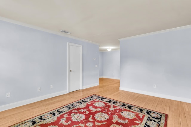 21 Rivers Point Row Unit 17G, Charleston, SC 29412 - unfurnished room featuring light wood finished floors, ornamental molding, and baseboards