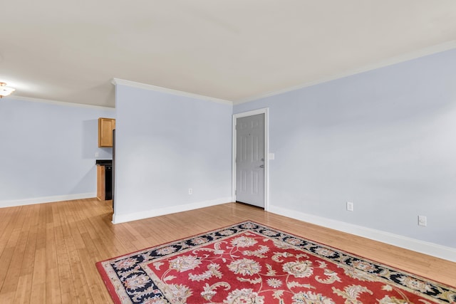 21 Rivers Point Row Unit 17G, Charleston, SC 29412 - unfurnished room with ornamental molding, light wood-style flooring, and baseboards