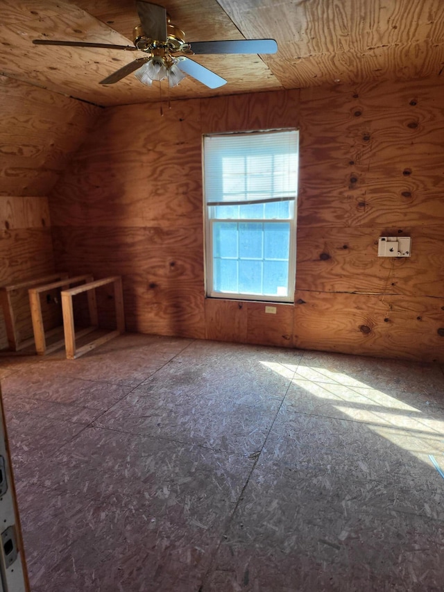 bonus room with lofted ceiling and ceiling fan