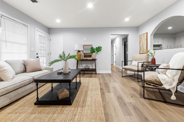 living room featuring light wood-type flooring