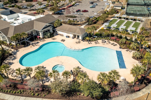 community pool featuring a patio area