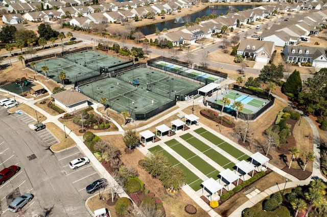 aerial view with a residential view and a water view