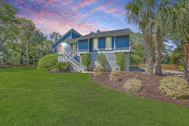 13 32nd Ave, Isle Of Palms, SC 29451 - view of front of home featuring stairway and covered porch
