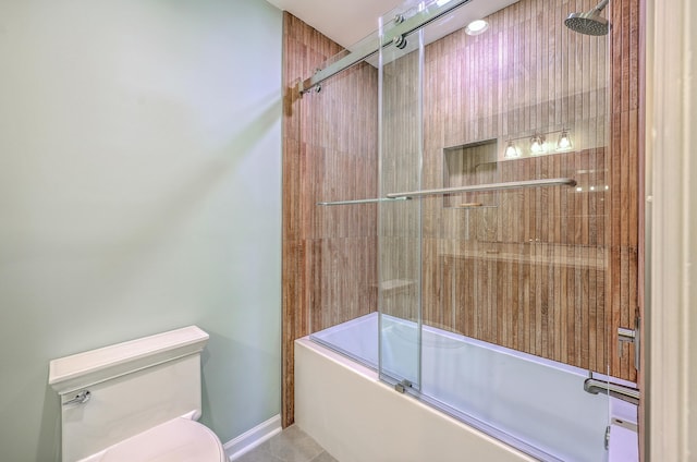 13 32nd Ave, Isle Of Palms, SC 29451 - bathroom featuring toilet and shower / bath combination with glass door