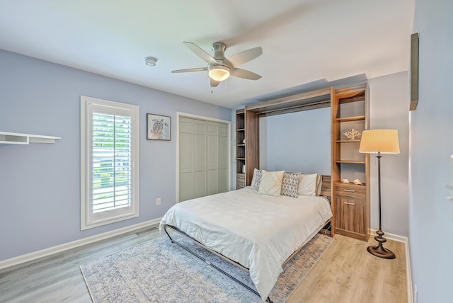 13 32nd Ave, Isle Of Palms, SC 29451 - bedroom featuring baseboards, light wood-style floors, a ceiling fan, and a closet