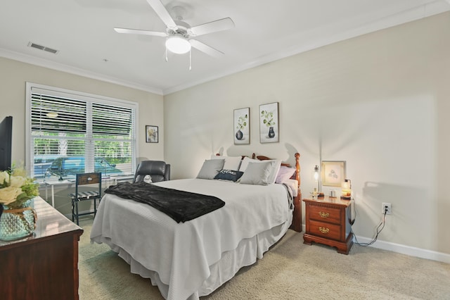 bedroom featuring baseboards, ornamental molding, carpet, and visible vents