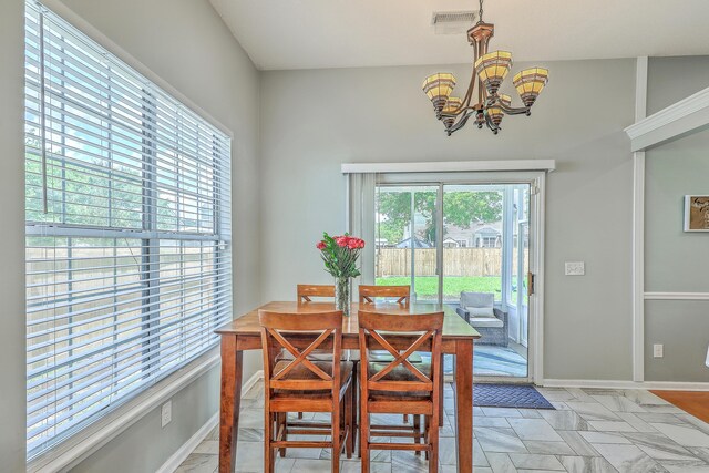 6179 Fieldstone Cir, Charleston, SC 29414 - dining area with a chandelier and baseboards