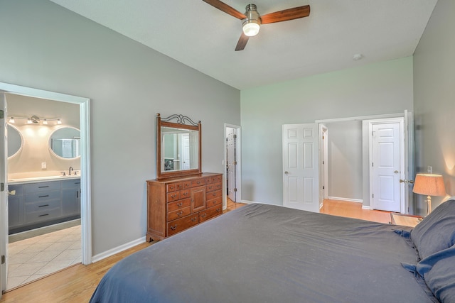 6179 Fieldstone Cir, Charleston, SC 29414 - bedroom featuring a sink, high vaulted ceiling, light wood-style floors, baseboards, and ensuite bathroom