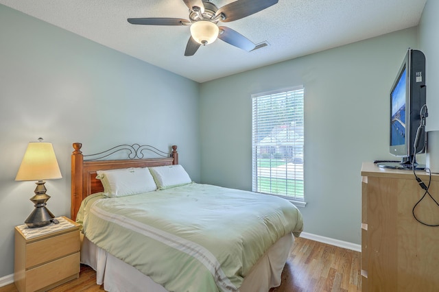 6179 Fieldstone Cir, Charleston, SC 29414 - bedroom with baseboards, light wood-type flooring, and a ceiling fan