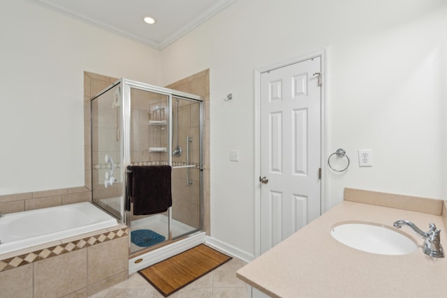 bathroom featuring tile patterned floors, crown molding, sink, and independent shower and bath