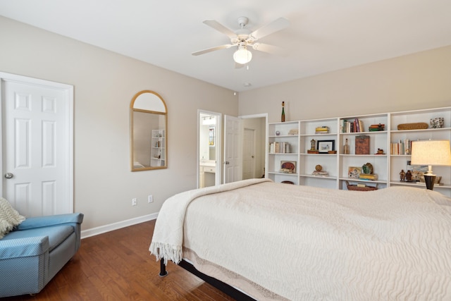 bedroom with connected bathroom, dark hardwood / wood-style floors, and ceiling fan