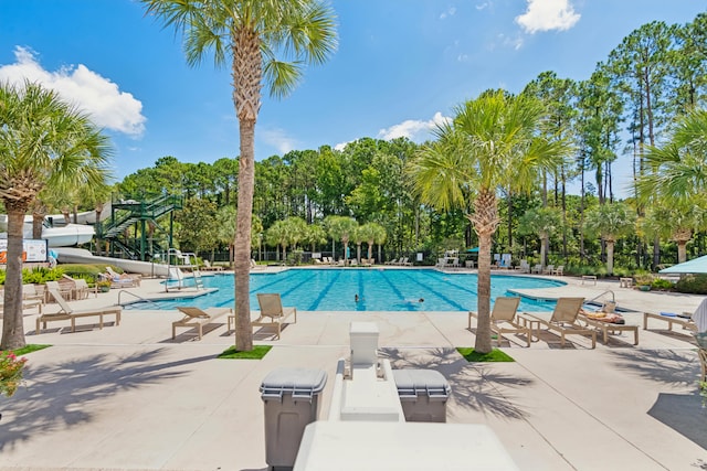 view of pool featuring a patio