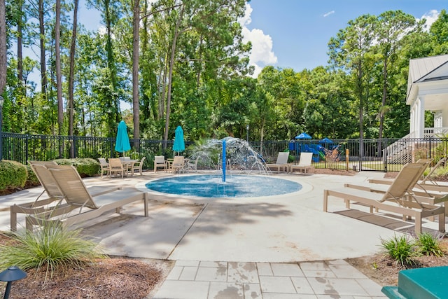 view of swimming pool featuring a patio