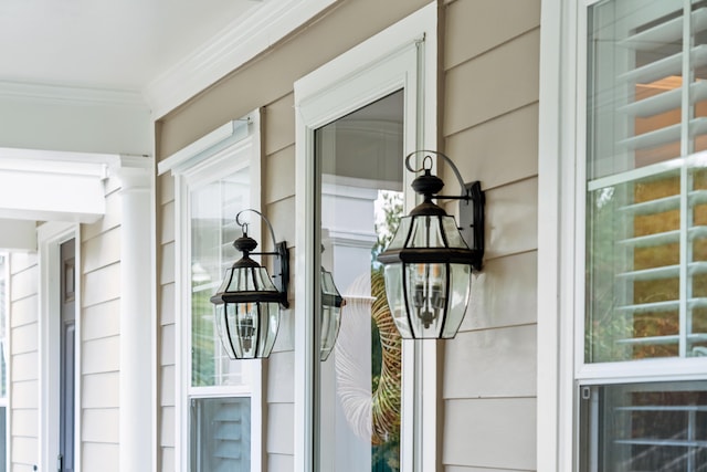 exterior details featuring crown molding