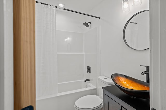 bathroom with vanity, toilet, and shower / tub combo with curtain