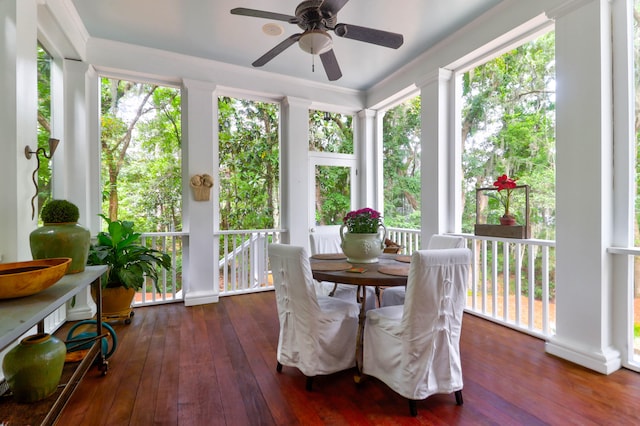 sunroom / solarium featuring ceiling fan