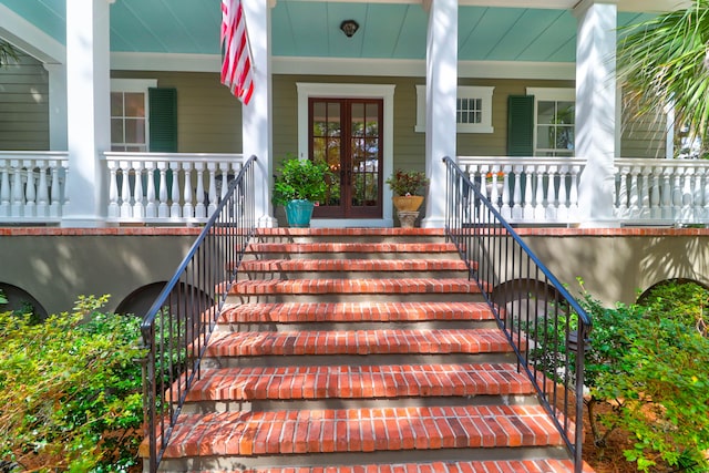 entrance to property featuring covered porch